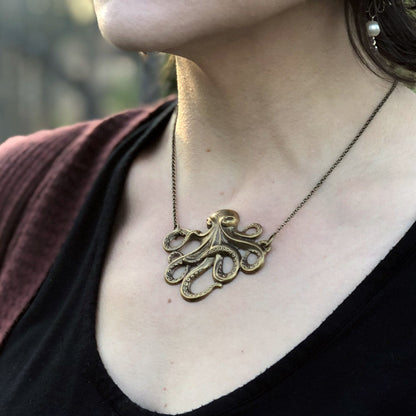Antiqued brass octopus pendant necklace.