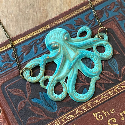 Teal patinaed brass octopus pendant necklace.