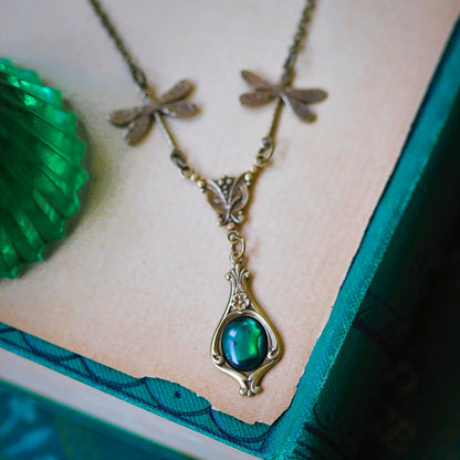 antiqued brass vintage-style dragonfly simple drop green shell pendant in victorian aesthetic