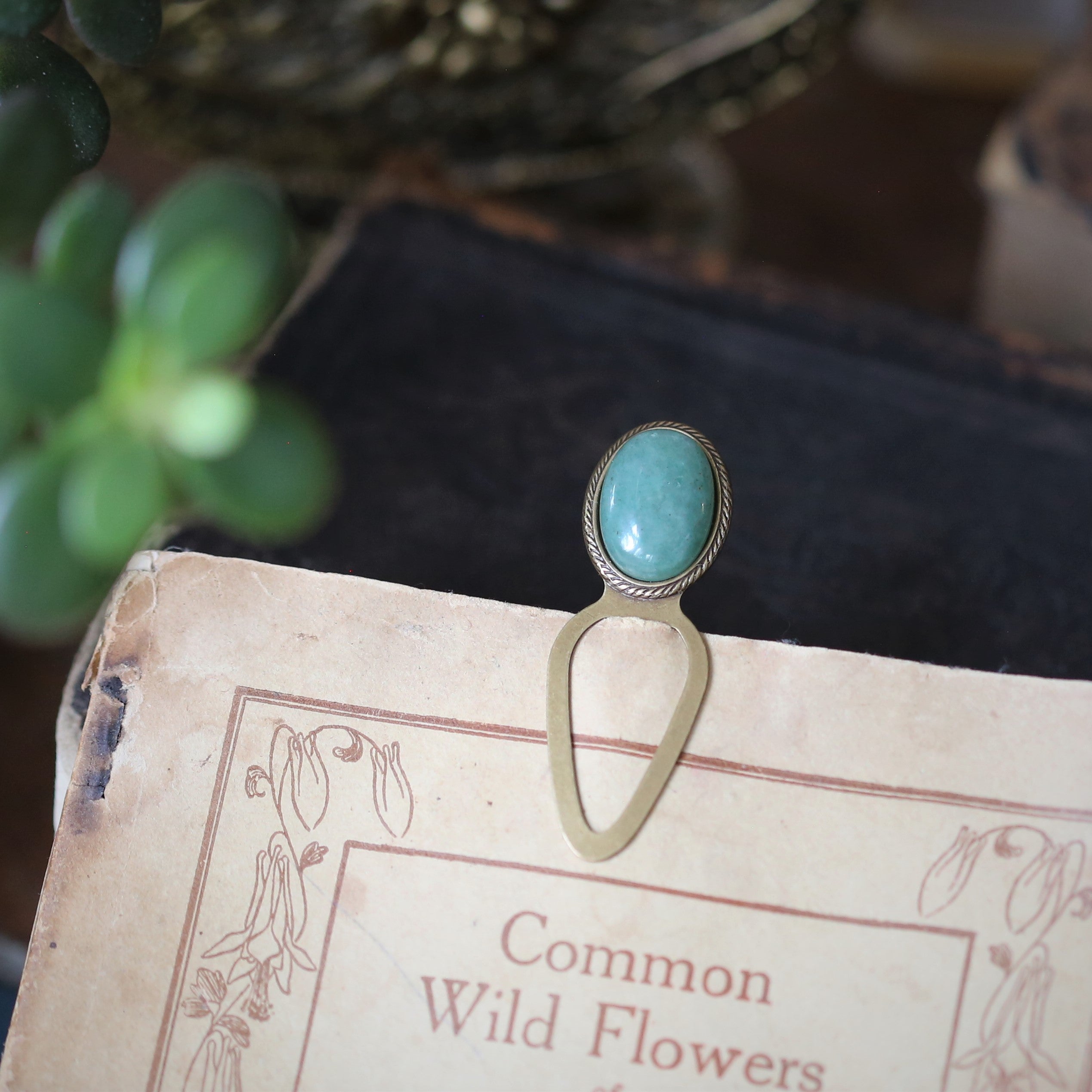 Antiqued brass metal clip rock bookmarks with oval semi-precious oval stone cabochons in green aventurine gemstone in cottagecore style gift for book lover