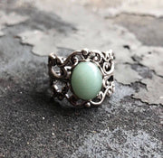 Antiqued silver adjustable vintage style filigree stone ring with green oval mineral by ragtrader vintage..