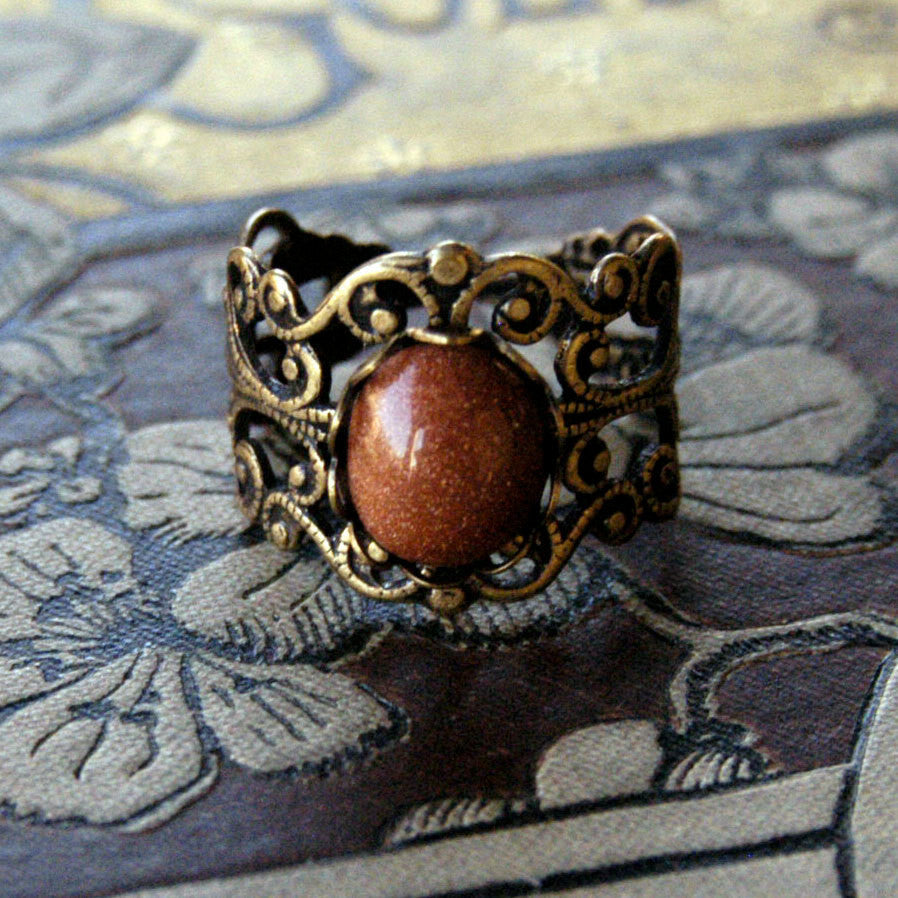 Goldstone and Brass Filigree Ring