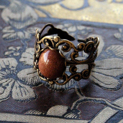 Goldstone and Brass Filigree Ring