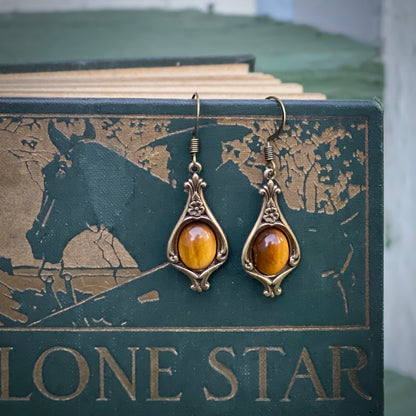 Antiqued brass vintage style stone drop brown tigers eye oval mineral hook earrings.