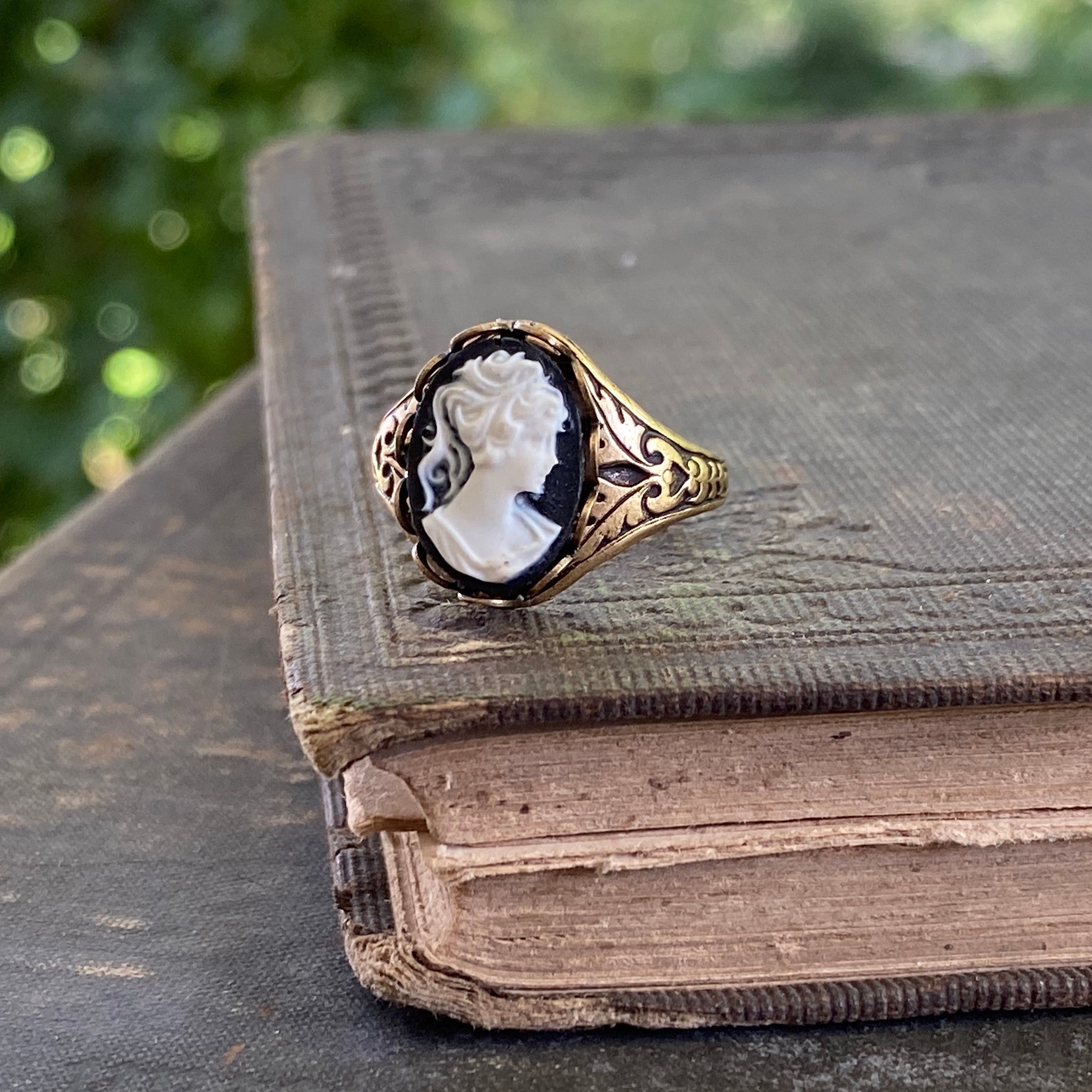 Antiqued brass vintage style adjustable ring with black and white cameo lady