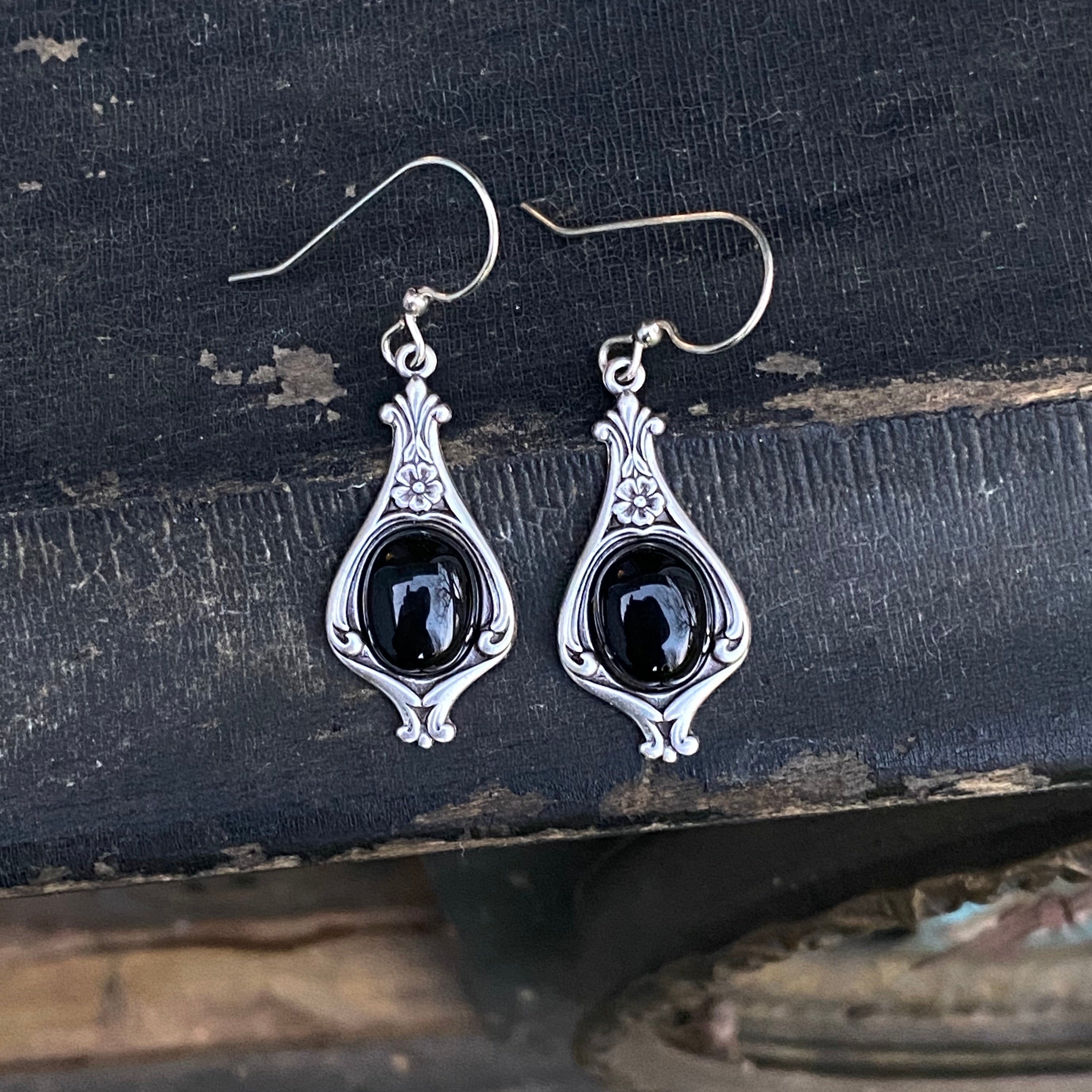 Antiqued silver vintage style stone drop black onyx oval mineral hook earrings.