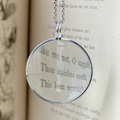 antiqued silver vintage style monocle magnifying glass useful necklace with Victorian style filigree.