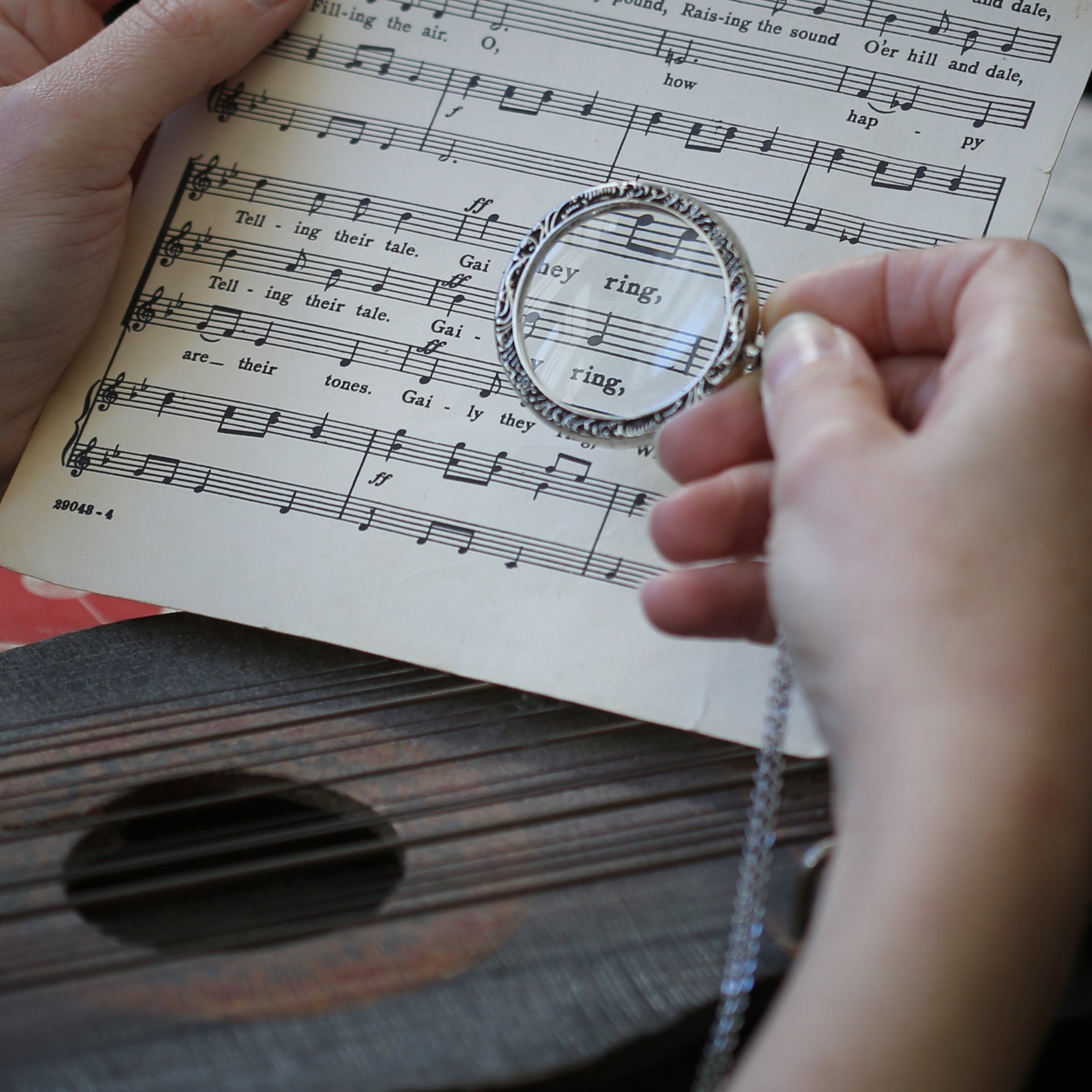 antiqued silver vintage style magnifying glass useful thick monocle long necklace in dark academia style jewelry