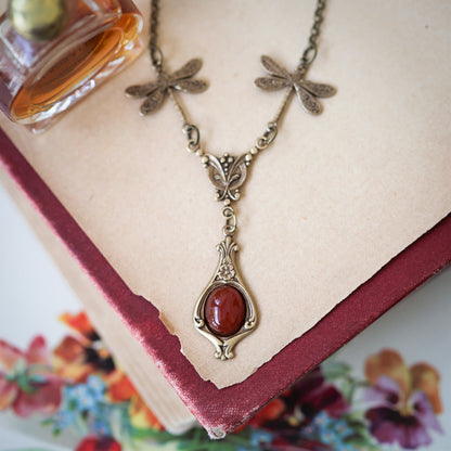 antiqued brass vintage-style dragonfly and orange carnelian stone pendant drop necklace in autumn gothic style