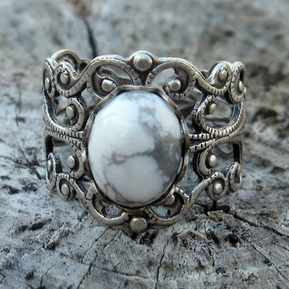 antiqued silver modern vintage inspired adjustable filigree ring with a white marble howlite semi-precious mineral oval stone in the white goth aesthetic
