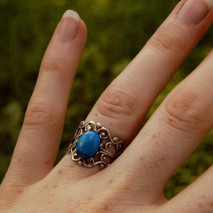 antiqued brass modern vintage inspired adjustable filigree ring with a turquoise blue holite oval semi-precious mineral stone in the beachday fashion aesthetic.