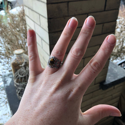 antiqued silver mod vintage inspired resizeable filigree ring with brown oval tiger eye semi-precious stone mineral perfect for an vanilla girl outfit.