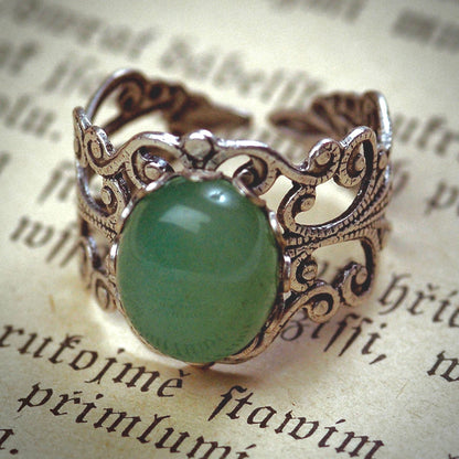 Antiqued silver adjustable mod vintage-inspired filigree ring with a green aventurine semi-precious stone mineral in the boho aesthetic